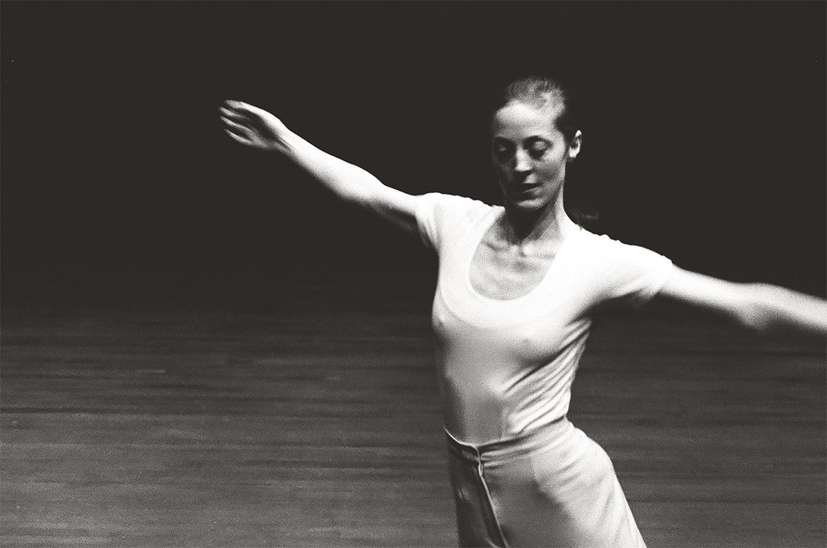 a ballerina in a white top