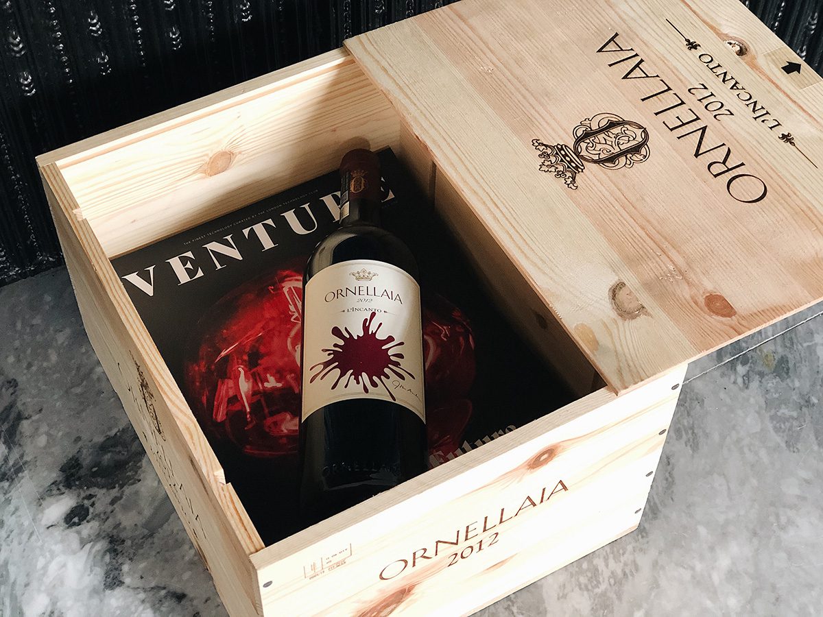 a wine bottle in a wooden case