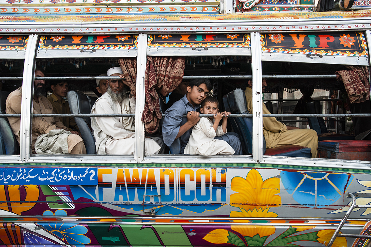 people on a bus which has been painted on