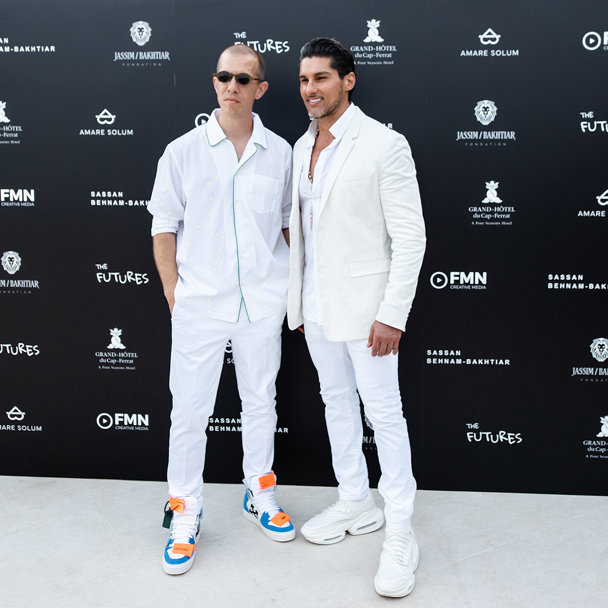two men in white outfits
