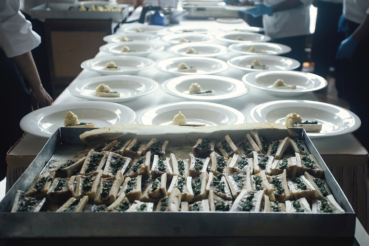 plates prepared and food in a crate 