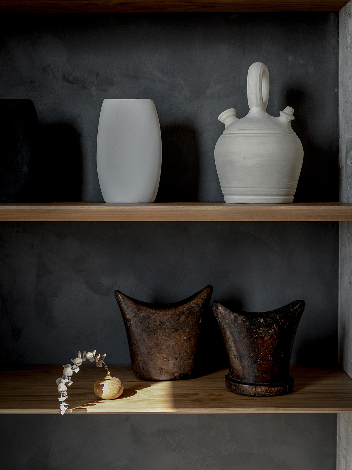 white and bronze vases and jugs