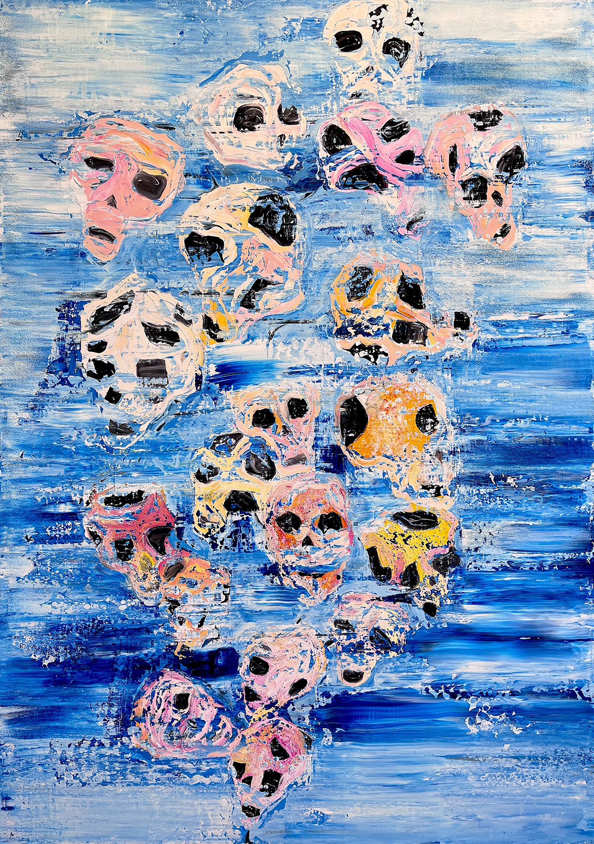 painted coloured skulls on a blue background