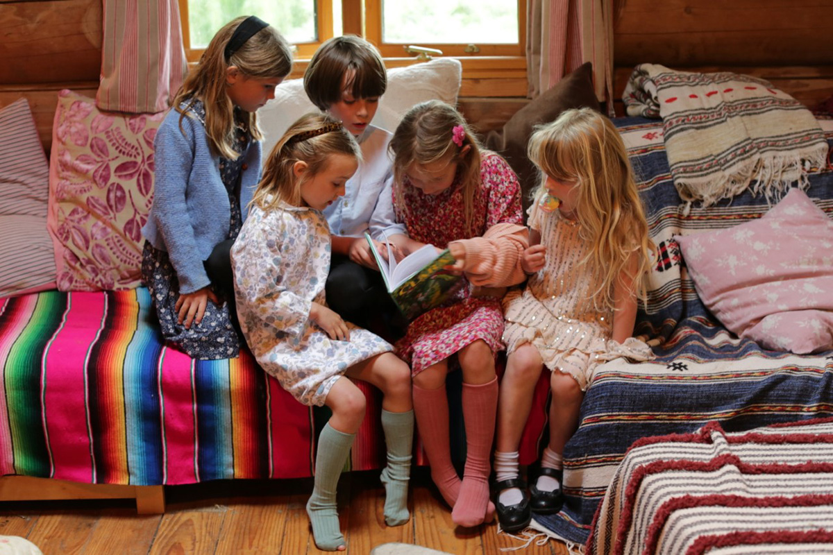 children reading a book