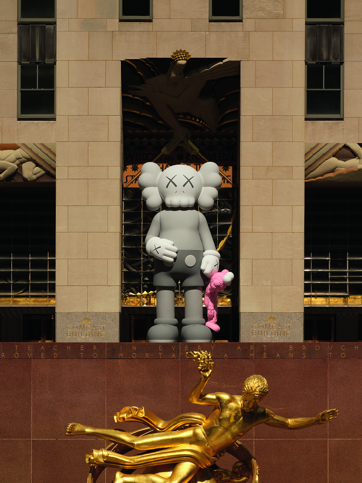 A large sculpture of a standing elephant in an entrance