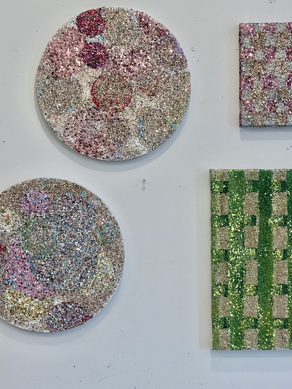 glitter on round and square canvases 