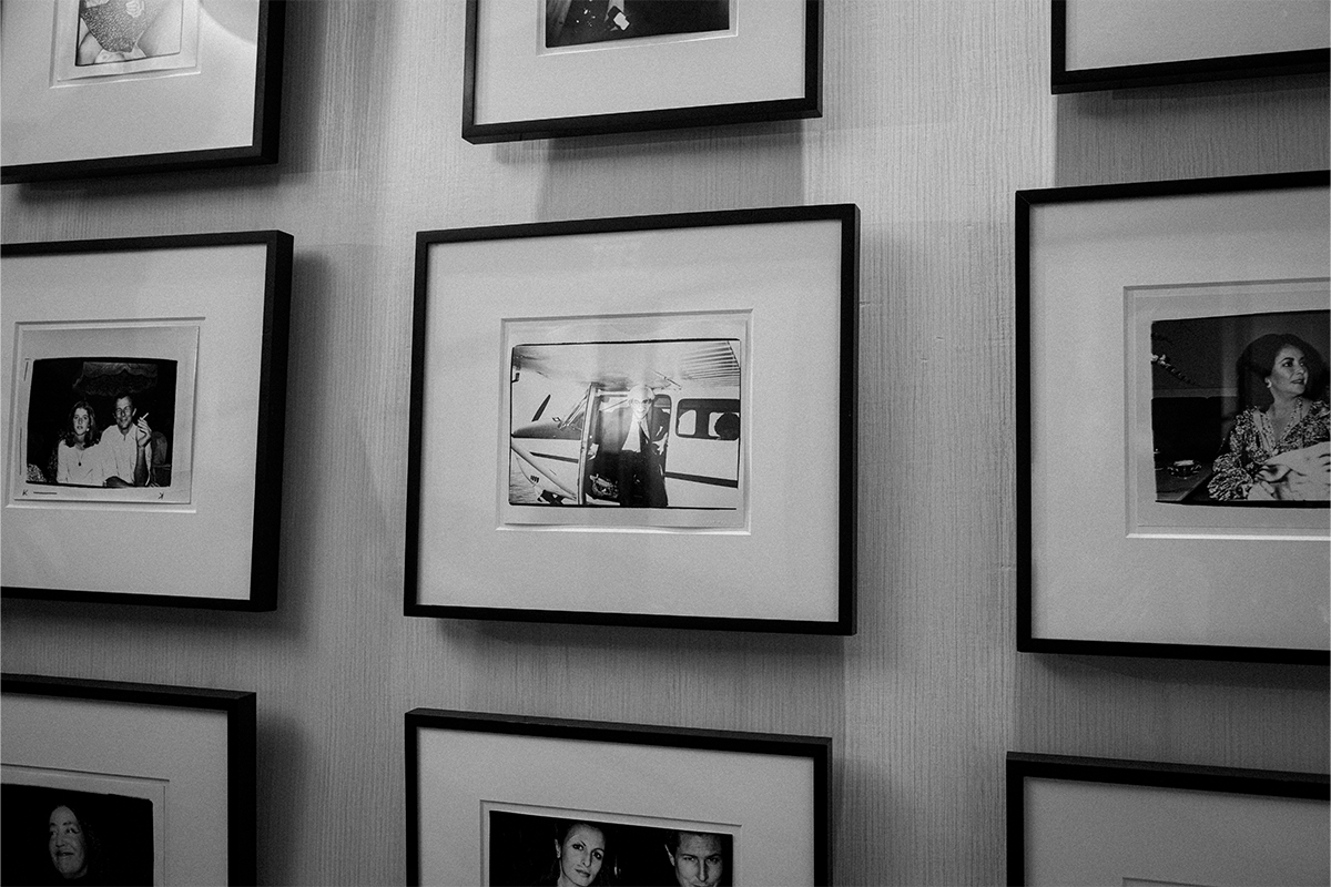 framed polaroids hung up on a wall