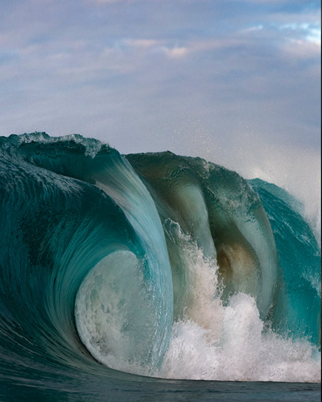 waves curling into the water
