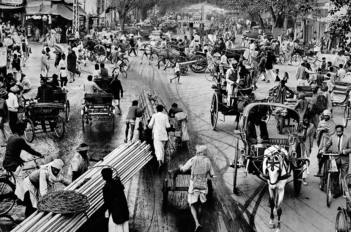 Crowds of people walking in a town