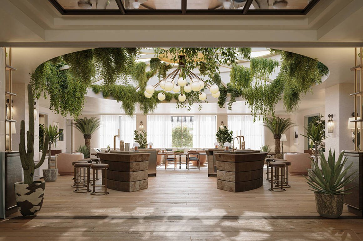 A hotel lounge with leaves hanging from the ceiling and plants on the floor