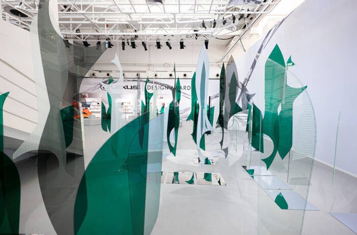 Green and white glass sheets in a room