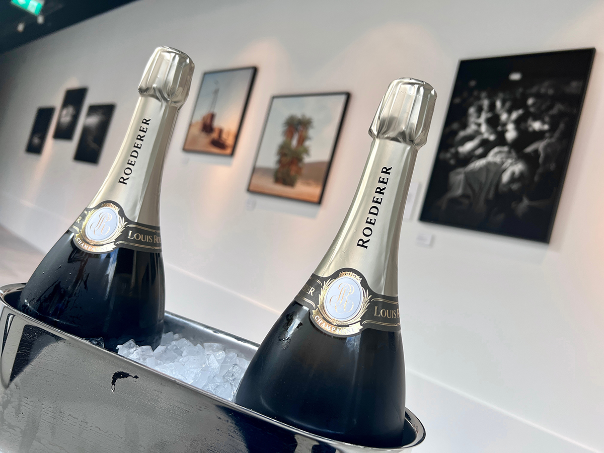 champagne bottles in an art gallery