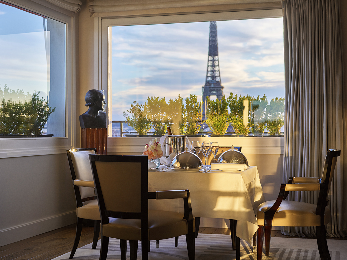 A table with a view of the Eiffel Tower