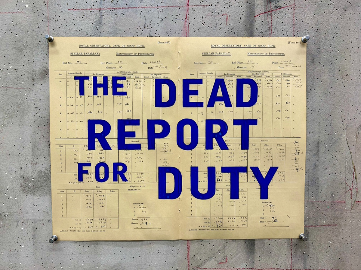 a yellow file note which says The Dead Report For Duty in large blue font