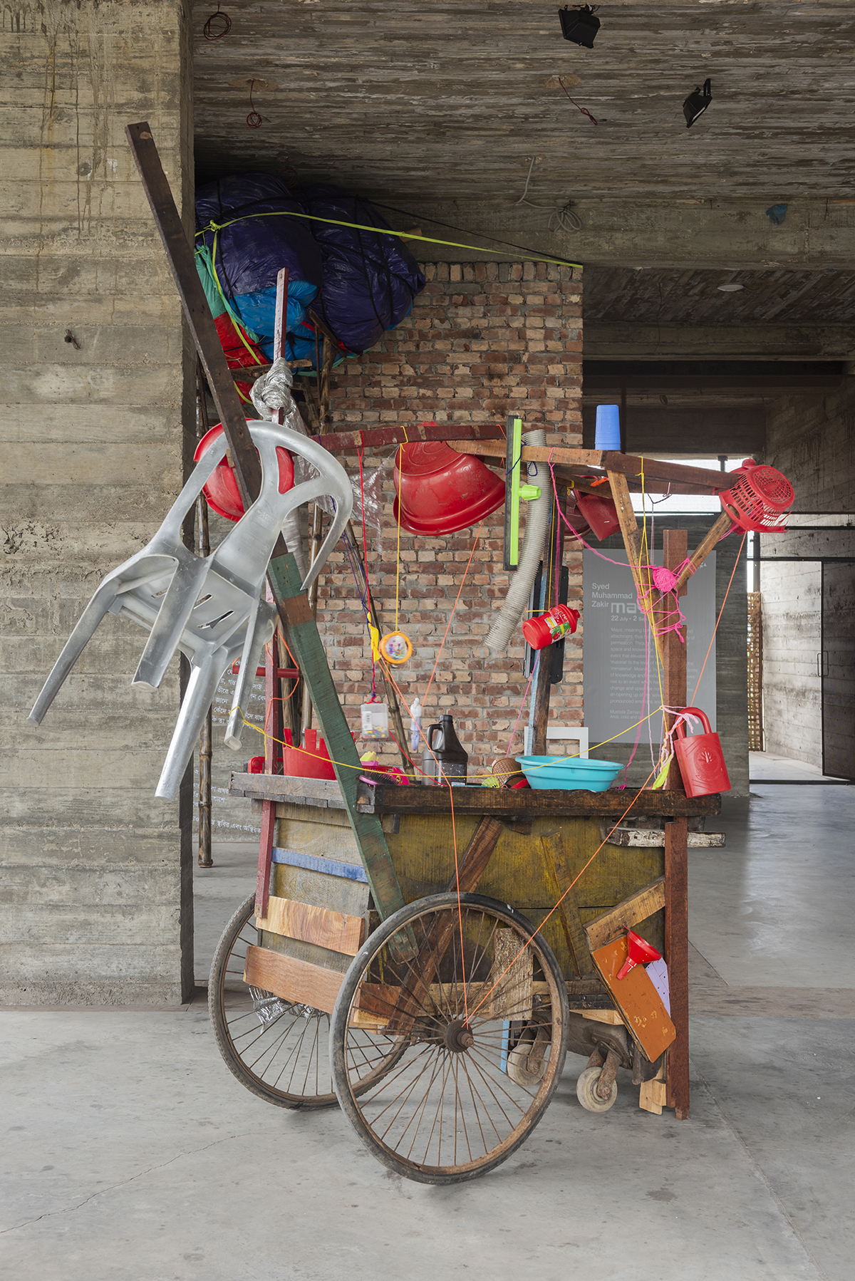 Plastic items hanging off a cart