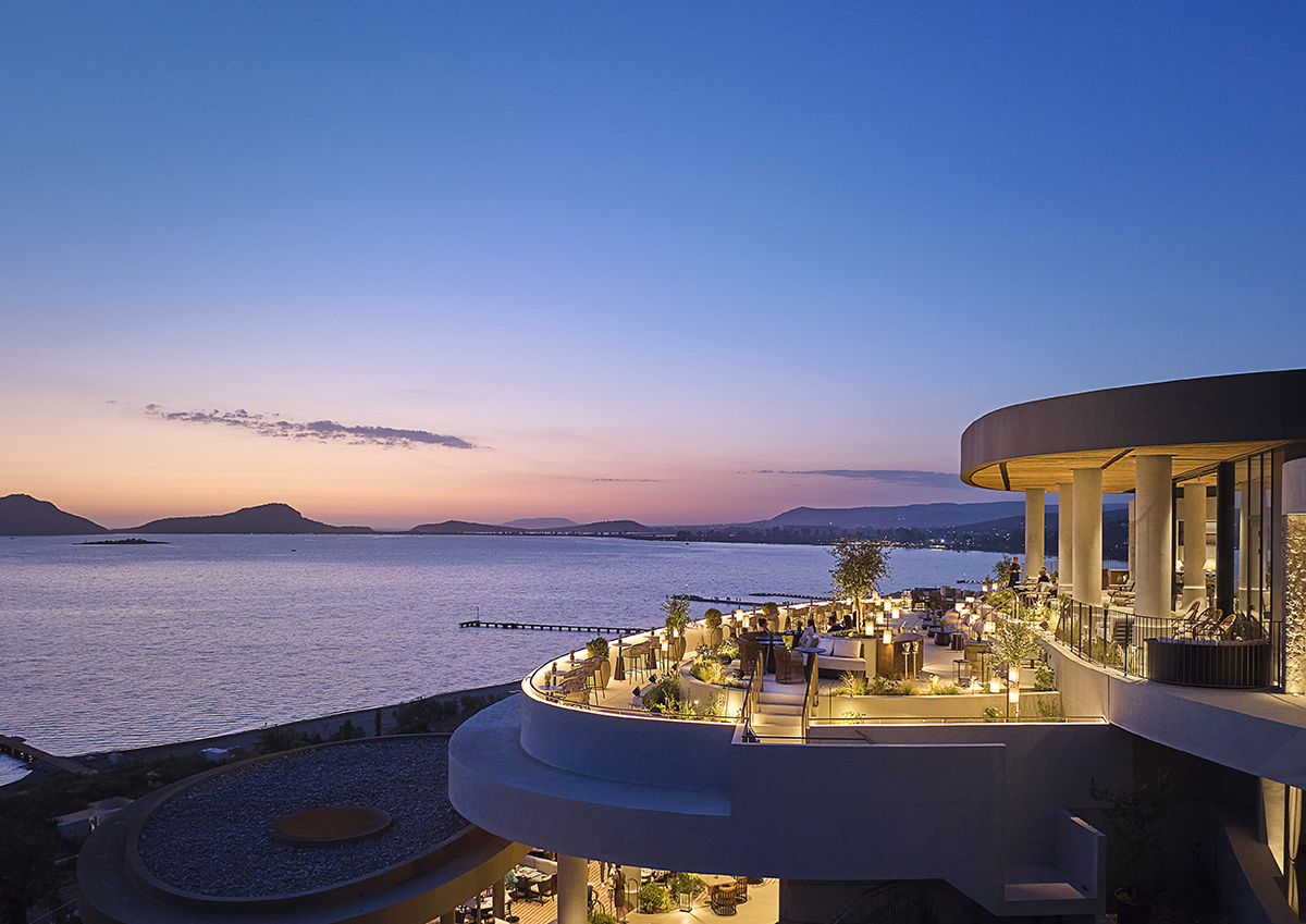 A sunset and a hotel overlooking the sea