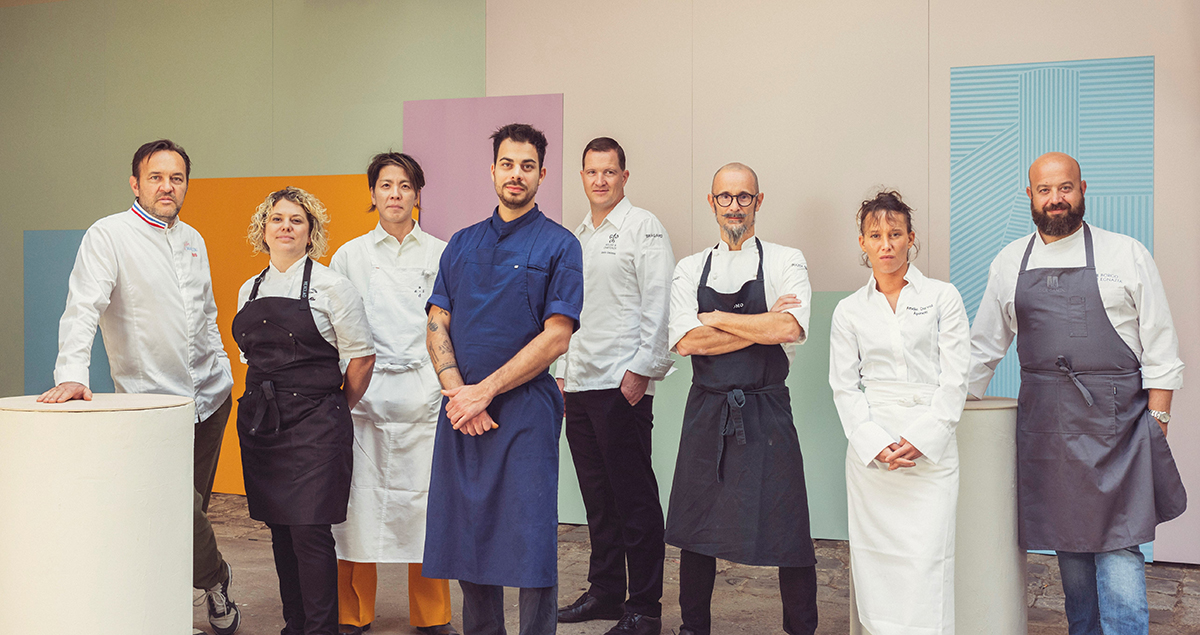 A group chefs standing next to eachother