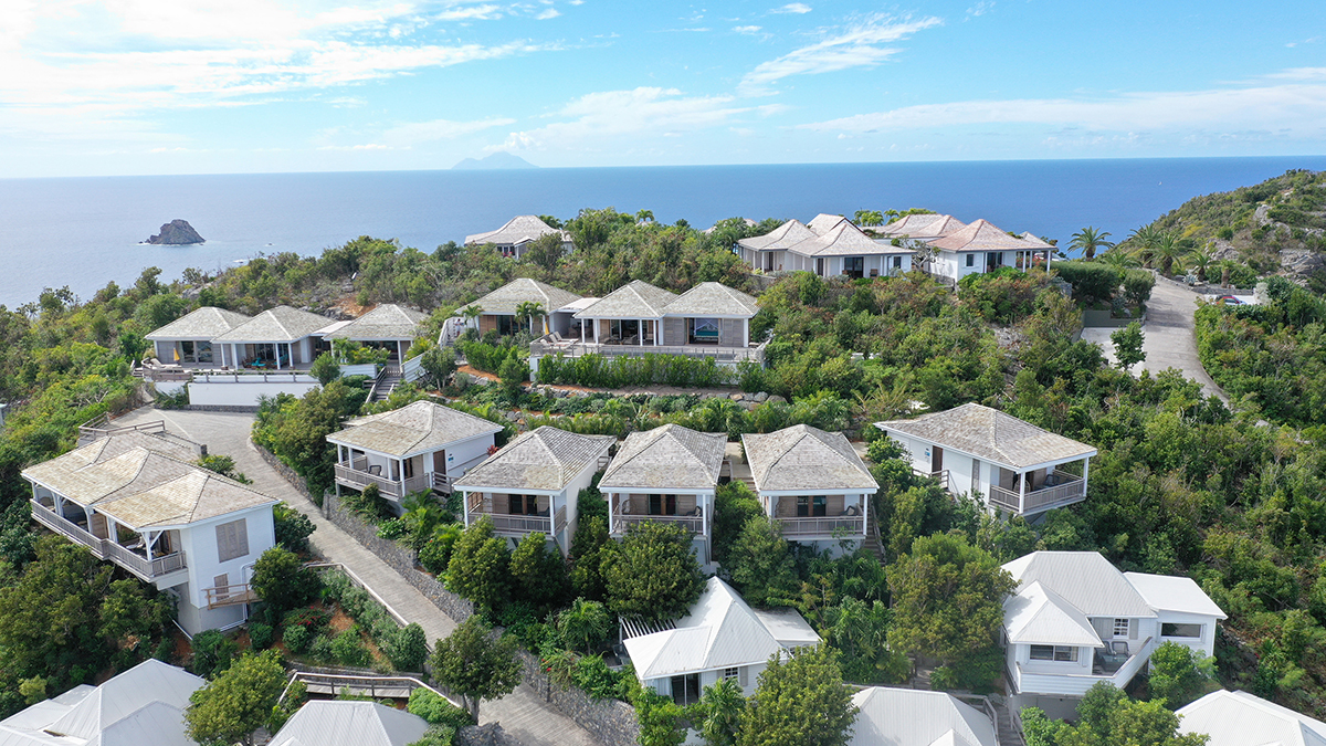 Bungalows on a hilltop overlooking the sea