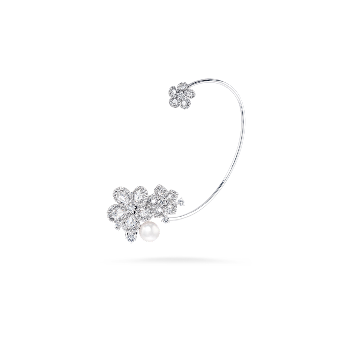 Diamond and white gold bracelet half open with flowers on the edges