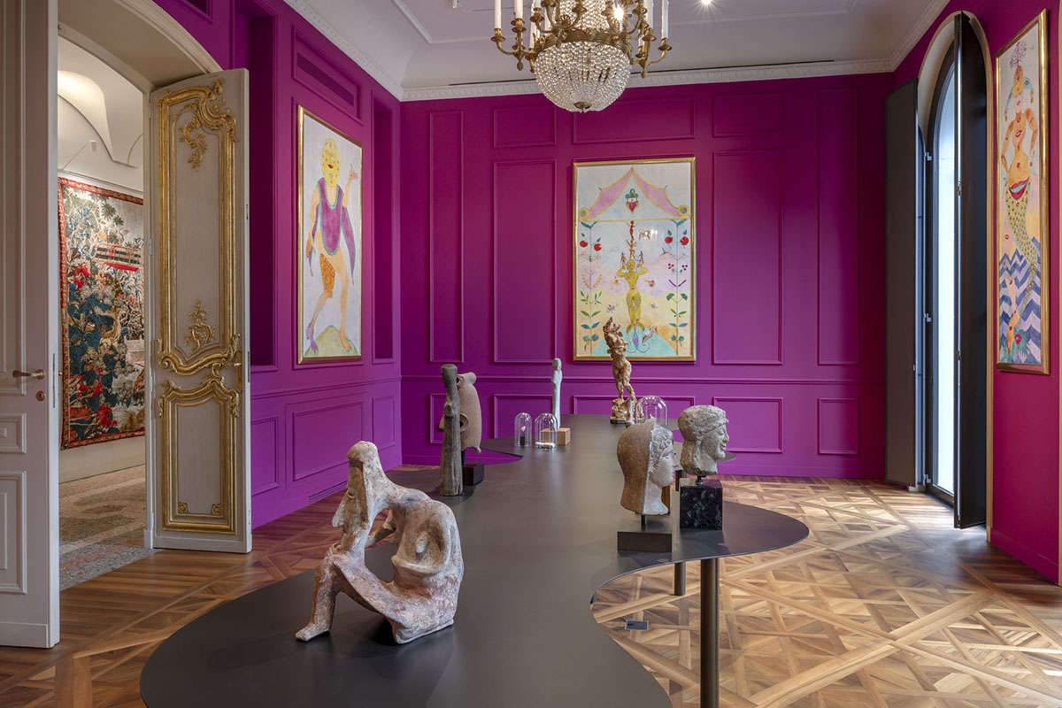 Purple room filled with art