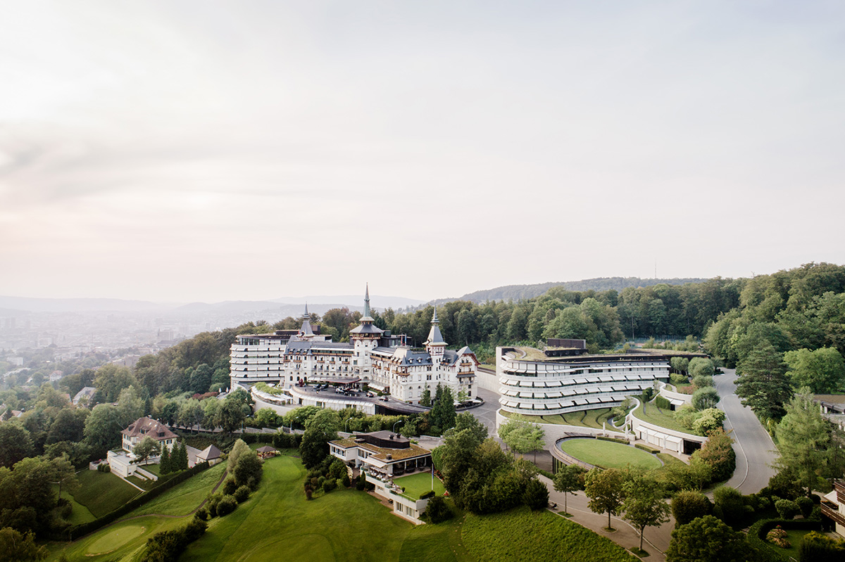 A palace in the hills surrounded by gardens