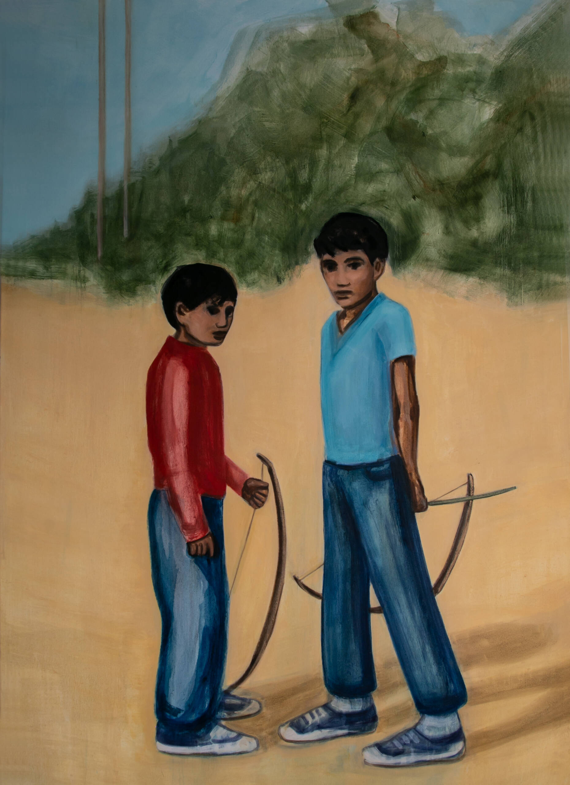 two boys standing next to each other holding bows and arrows
