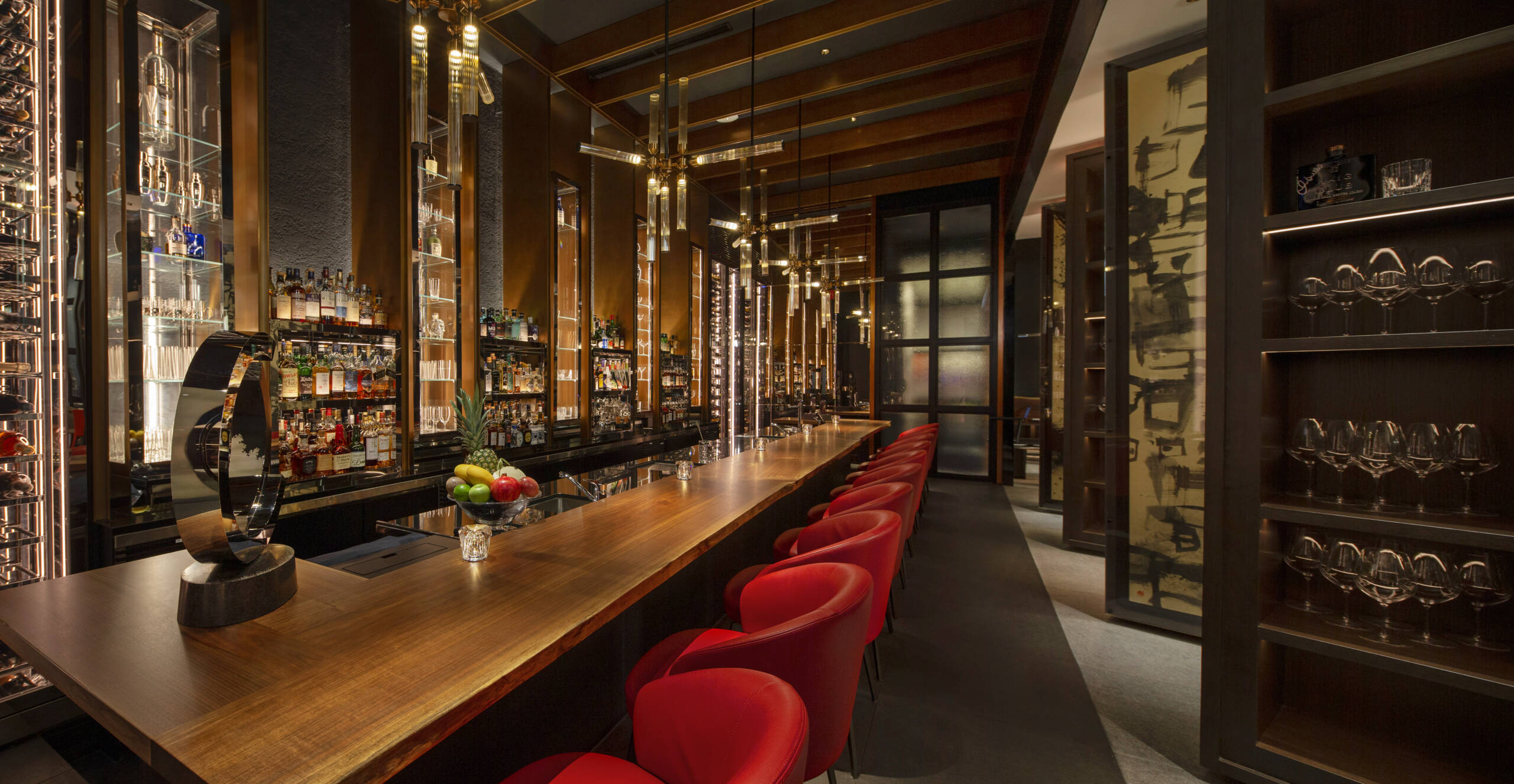 Stylish bar with red chairs
